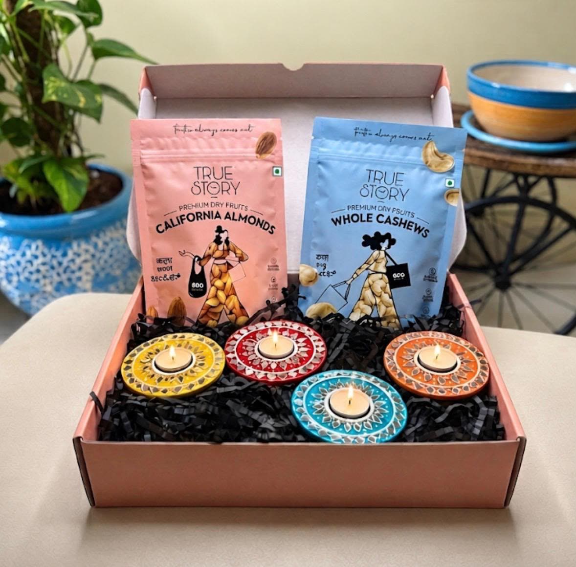 Chaturdeep Gift Box — 4 Tealight Holders with Dry Fruits — handmade set of 4 lippan mirror tealight holders with 100g california almonds & 100g whole cashews in gift box by Rachna Saxena